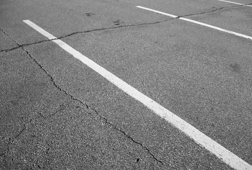 Preventative Crack Filling vs Full Asphalt Repairs: Which Is Best for Your Parking Lot?